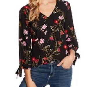 CeCe floral blouse size M.  New without tags